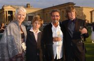 Eddie Jordan and his family at the Silverstone Grand Prix Ball 2004 in Buckingham, England. (Image via Getty/Steve Finn)